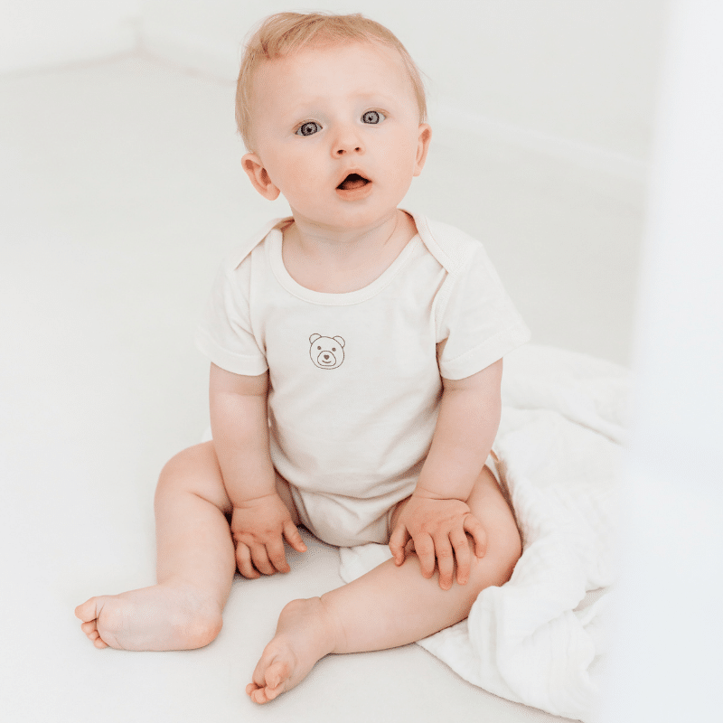 What Is The Difference Between A Baby Bodysuit & Sleepsuit? We Reveal